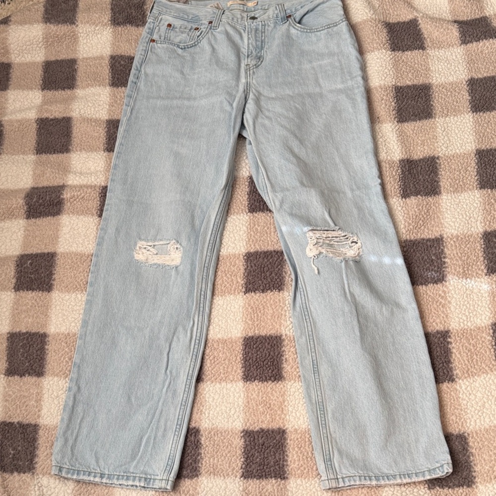 Levi's Light Blue Straight Leg Jeans with Distressed Details
